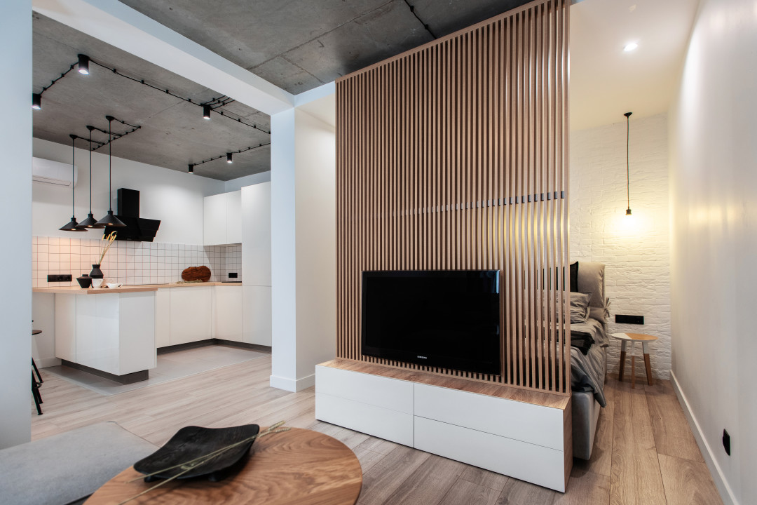 Modern apartment interior design showcasing elegant living space with contemporary furniture and sophisticated lighting